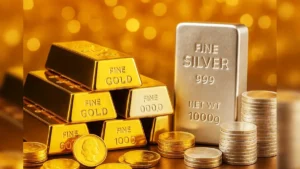 Gold and silver bars with price charts showing recent downward trend