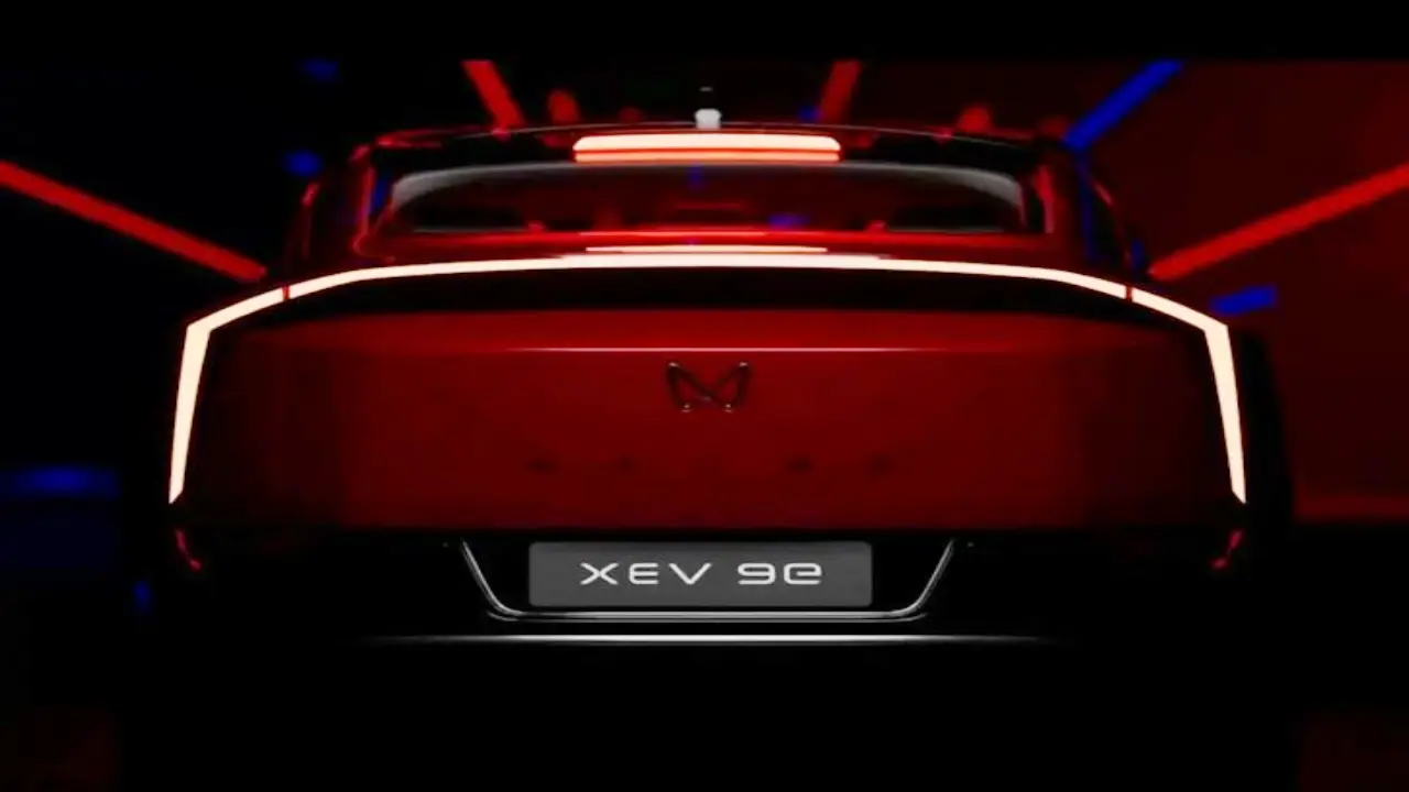 Mahindra XEV 9e electric SUV front view in blue color