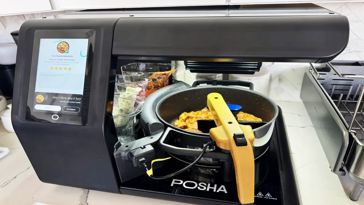 AI robot cooking Paneer Butter Masala in smart kitchen setup