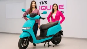 TVS iQube 2025 electric scooter rear design with futuristic LED lights in white studio background